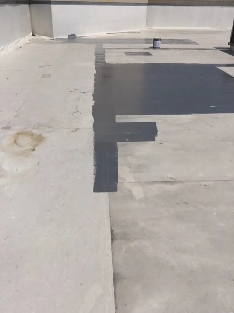 Restoration work on a commercial low-slope roof membrane with reinforcing sealants